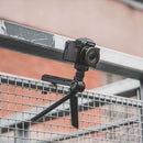 PGYTECH MantisPod tripod holding Lumix camera mounted on metal railing, versatile portable tripod with multiple shooting modes