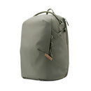 A green backpack on a white background