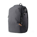 A black backpack on a white background