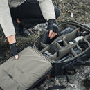 PGYTECH Focux 35L Backpack open with organized camera gear and customizable dividers outdoors