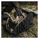 PGYTECH OnePro ST Backpack with customizable padded dividers and camouflage rain cover holding camera gear outdoors