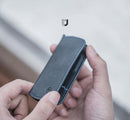PGYTECH Memory Card Wallet in deep navy with embossed buttermilk skin and compartments for SD, SIM cards, and tools