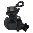 Panasonic HC-X2100 4K camcorder with wide-angle lens, 24x optical zoom, detachable handle, and tiltable OLED viewfinder.