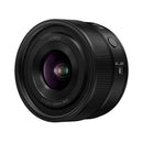 Panasonic S 20mm f2.5 lens on a white background