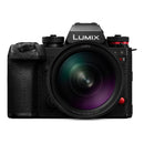Panasonic S1R II with 24-60mm f2.8 lens attached on a white background
