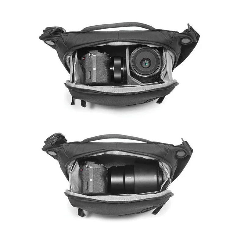Peak Design Everyday Sling V3 3L in black with spacious padded compartments holding DSLR camera and lenses.