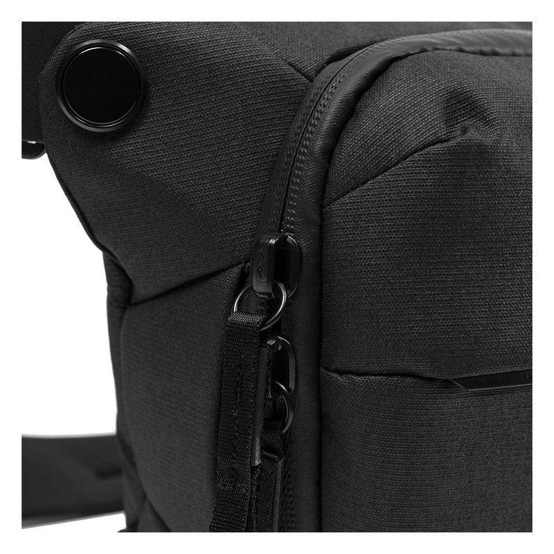 Close-up of black Peak Design Everyday Sling V3 6L camera bag with durable nylon fabric and secure zipper closure