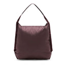 Peak Design Packable Tote in burgundy with zip closure and single padded shoulder strap, made from durable, water-resistant recycled nylon fabric.