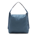 Blue ultralight Peak Design Packable Tote bag with zip closure and padded shoulder strap