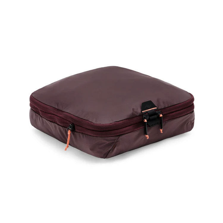 Peak Design Packing Cube Medium in maroon with tear-away zipper and expandable compression design
