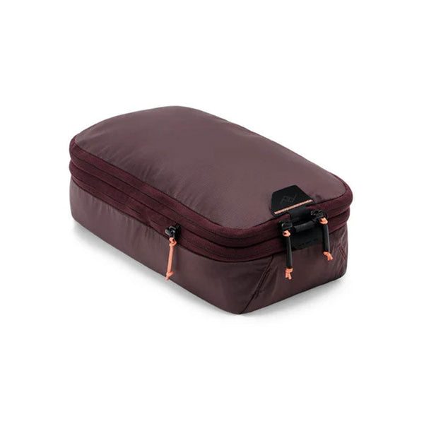 Peak Design Packing Cube small compressible travel organizer with tear-away zipper and expandable compartments in dark color