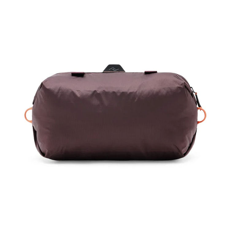 Compact Peak Design Shoe Pouch in dark color, ultralight and durable storage bag for shoes or clothes with abrasion-resistant zipper