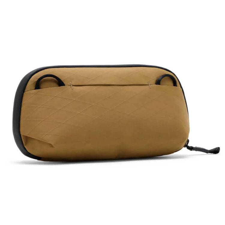 Peak Design Tech Pouch Small in Coyote X-Pac Ocean Edition fabric for organizing everyday tech essentials