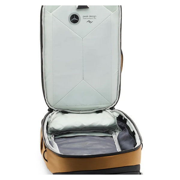 open brown and gray Peak Design Travel Backpack 30L with spacious interior and organized compartments