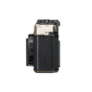 Pentax 17 Film Camera side view with black leather grip and silver magnesium alloy top and bottom covers