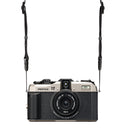 Pentax 17 Film Camera with 25mm F3.5 lens, manual controls, magnesium alloy body, and half-frame format