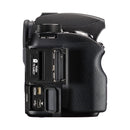Side view of Pentax KF Body showing card slots and HDMI port with textured grip and control dials