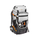 LowePro PhotoSport Backpack PRO 55L AW III in gray with orange accents, open front camera compartment showing professional photography lenses and gear, designed for outdoor hiking and multi-day missions.