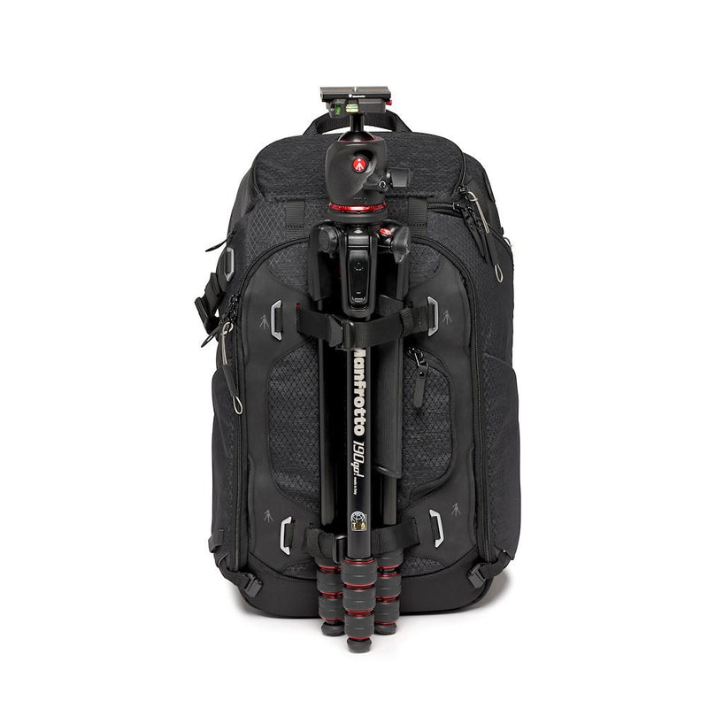 Black backpack with tripod attached to the front.
