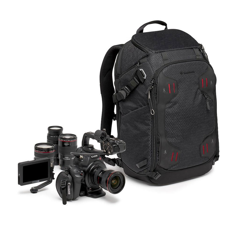 Black camera backpack with video camera equipment on a white background