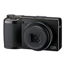 Ricoh GR IV compact digital camera with 18.3mm F2.8 lens and textured grip