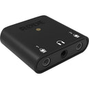 Compact black Rode AI-Micro dual-channel audio interface with 3.5mm microphone and headphone ports