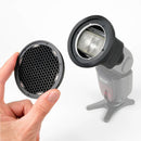 Rogue Flash Grid 45 honeycomb light modifier attaching to camera flash for controlled light direction