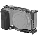 SmallRig Camera Cage with grip for Sony ZV-E10 featuring ergonomic handle and multiple accessory mounts