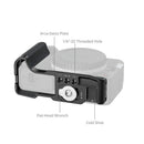 SmallRig L-Shaped Mount Plate with Handle attached to Canon EOS R50 V camera showing ergonomic silicone grip and built-in cold shoe mount