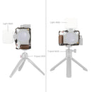 SmallRig Retro Cage with wooden grip and multiple mounts for Fujifilm X-M5 camera, shown with LED light and tripod attachments.