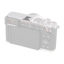 SmallRig Thumb Grip for Panasonic LUMIX L10 in silver mounted to a camera on a white background