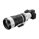 A black and white Sony telephoto zoom lens on a white background