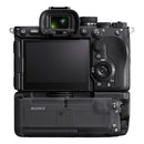 Sony camera body with detachable battery grip on a white background