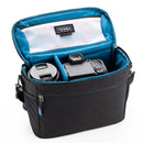 Tenba Skyline v2 13 Shoulder Bag black with blue interior holding camera and lens, durable water-repellent fabric, multiple compartments, and shoulder strap