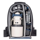 ThinkTank FirstLight camera backpack with padded compartments for DSLR, telephoto lens, drone, and accessories.