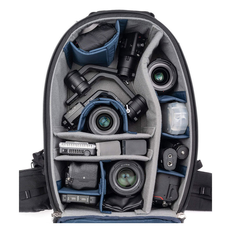 ThinkTank FirstLight camera backpack interior with organized compartments for lenses and photography gear