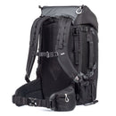 ThinkTank FirstLight 35L+ black durable photography backpack with adjustable torso harness, padded hip belt, multiple pockets, and tripod attachment system