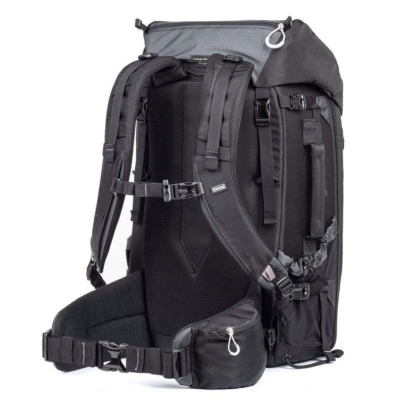 ThinkTank FirstLight 35L+ black durable photography backpack with adjustable torso harness, padded hip belt, multiple pockets, and tripod attachment system