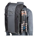 ThinkTank FirstLight 35L+ black and gray backpack with tripod attached, designed for outdoor photographers and travel.