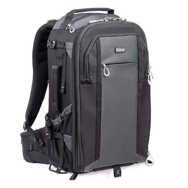ThinkTank FirstLight 35L+ black and gray backpack with adjustable harness and multiple compartments for outdoor photography gear
