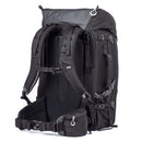 ThinkTank FirstLight 46L+ black durable travel backpack with adjustable torso harness, padded straps, and multiple compartments for camera gear and laptop