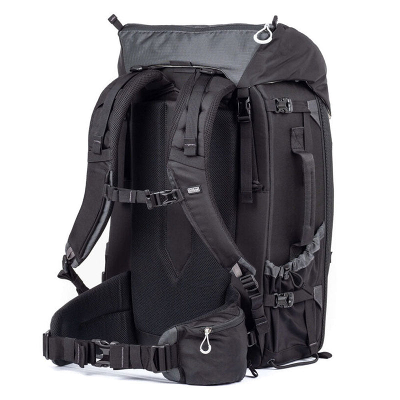 ThinkTank FirstLight 46L+ black durable travel backpack with adjustable torso harness, padded straps, and multiple compartments for camera gear and laptop