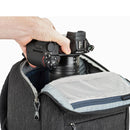 Thinktank BackStory 15 graphite camera backpack with rear-panel access and top quick-access compartment.