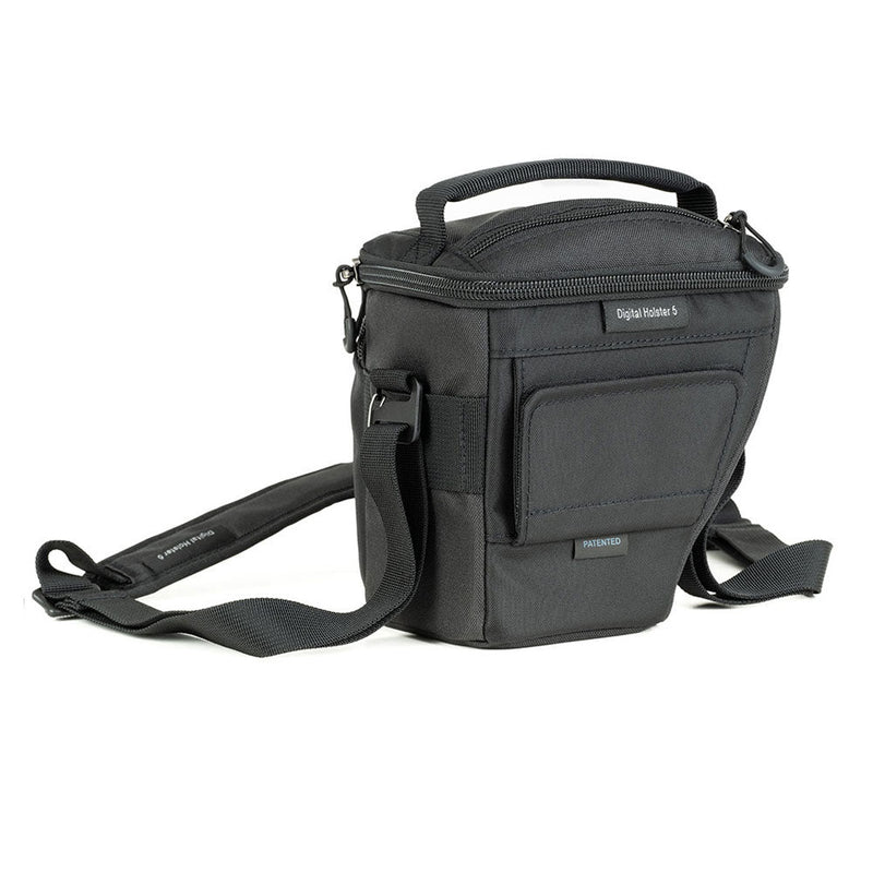 Compact black ThinkTank Digital Holster 5 v3 camera bag with shoulder strap and multiple zippered accessory pockets for mirrorless cameras