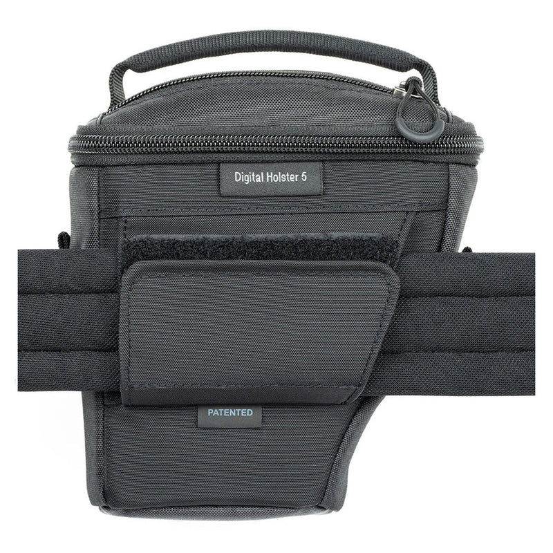 ThinkTank Digital Holster 5 v3 compact camera holster with multiple zippered pockets and belt attachment.