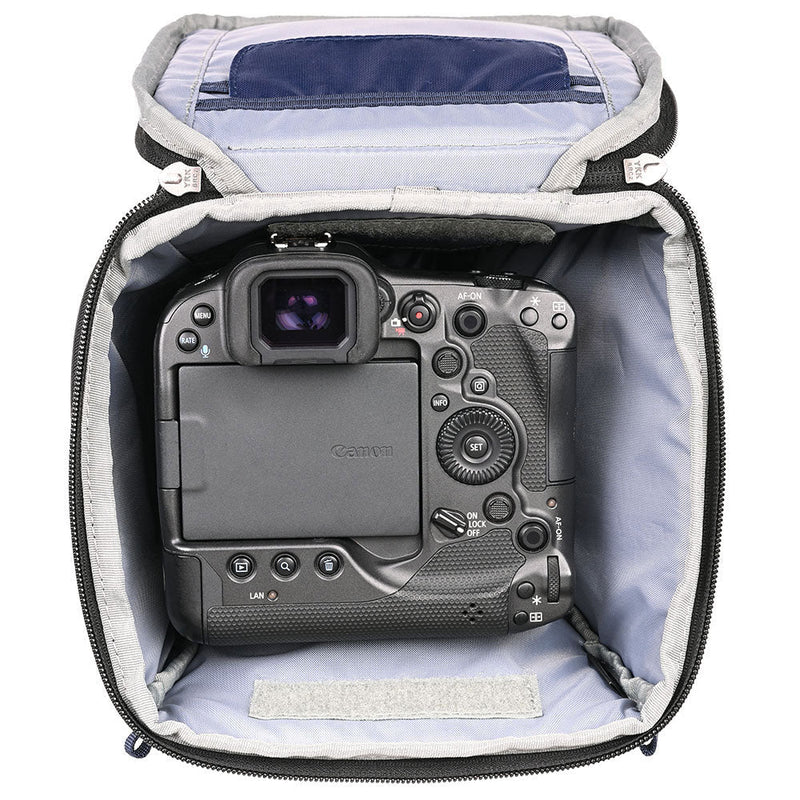 Interior view of Thinktank Digital Holster 50 v3 with a Canon gripped camera inside