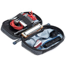 ThinkTank EDC Tech Pouch open with organized tech accessories and cables inside