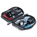 ThinkTank EDC Tech Pouch open with organized tech accessories inside