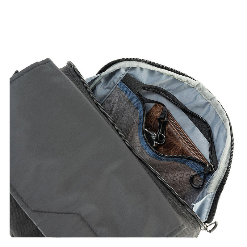 Open black Thinktank Mirrorless Mover Backpack showing interior compartments and zippered pockets