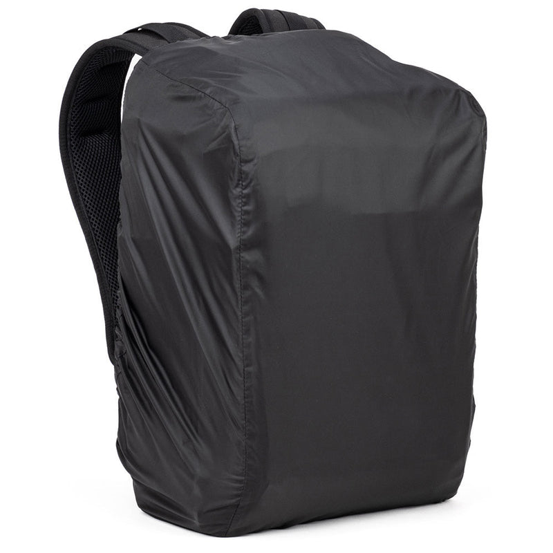 Thinktank Mirrorless Mover Backpack in rain cover, designed for mirrorless cameras with protective, customizable compartments and ergonomic features